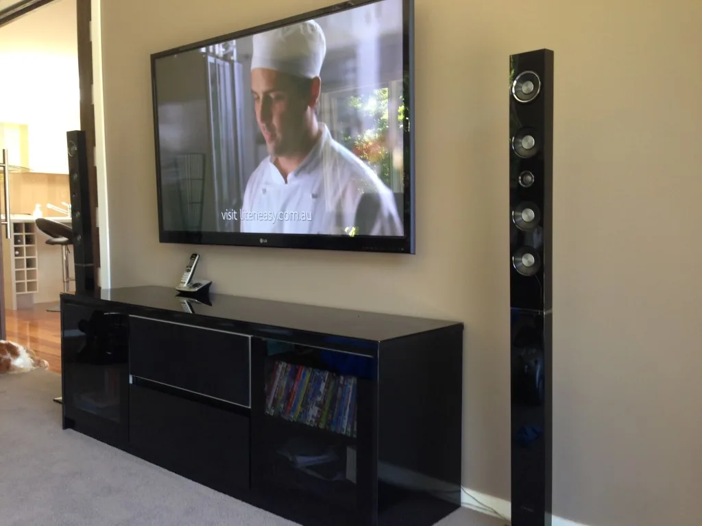 Hi-fi system installed with floorstanding speakers in a Melbourne living room